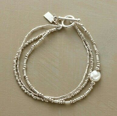 Conjunto de pulseras vintage con perlas