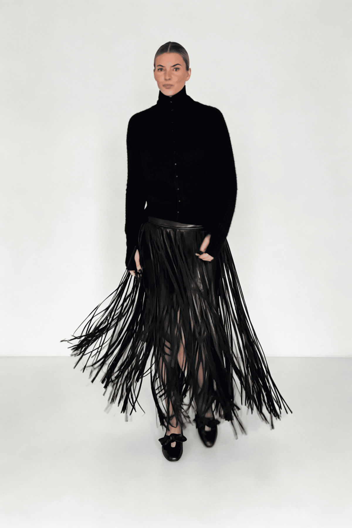 Yaiza | Falda midi negra con flecos