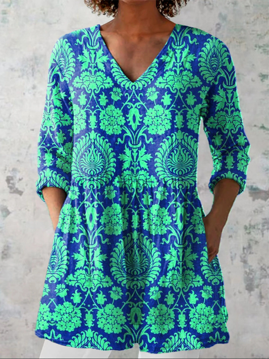 Beatrix – Blusa larga con escote en V elegante