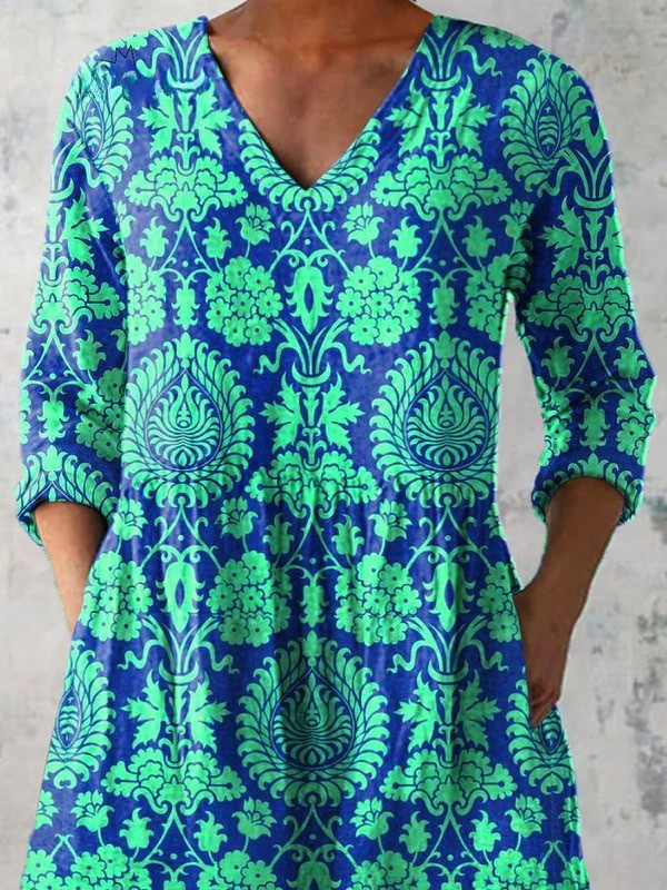 Beatrix – Blusa larga con escote en V elegante