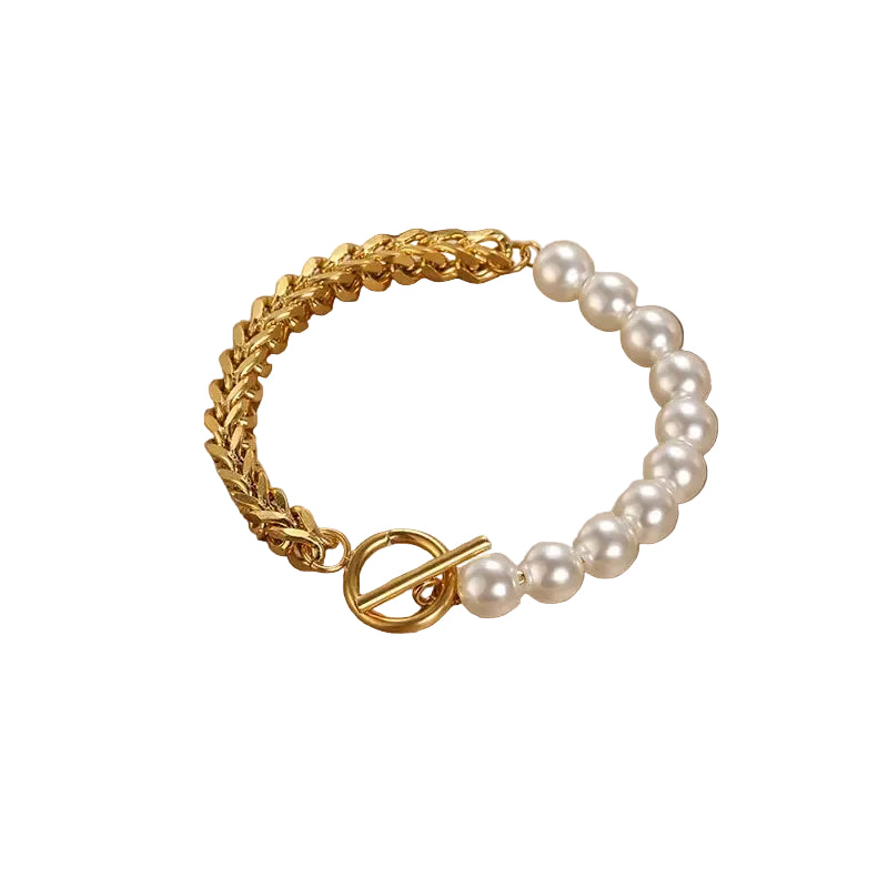 Pulsera elegante de oro y perlas