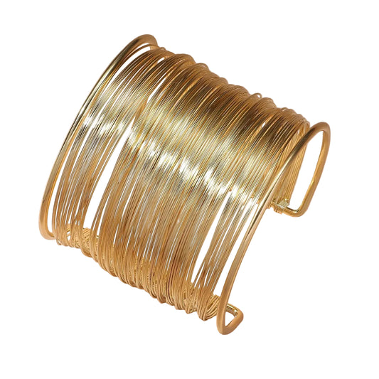 Pulsera abierta con espiral en oro